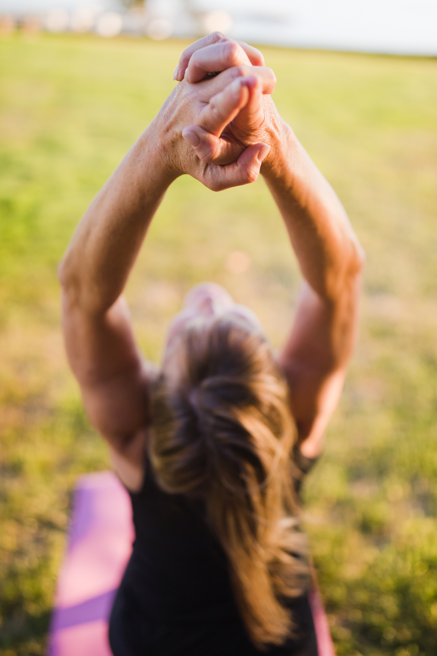 Marna Mcnaughton yoga instructor doing a yoga pose