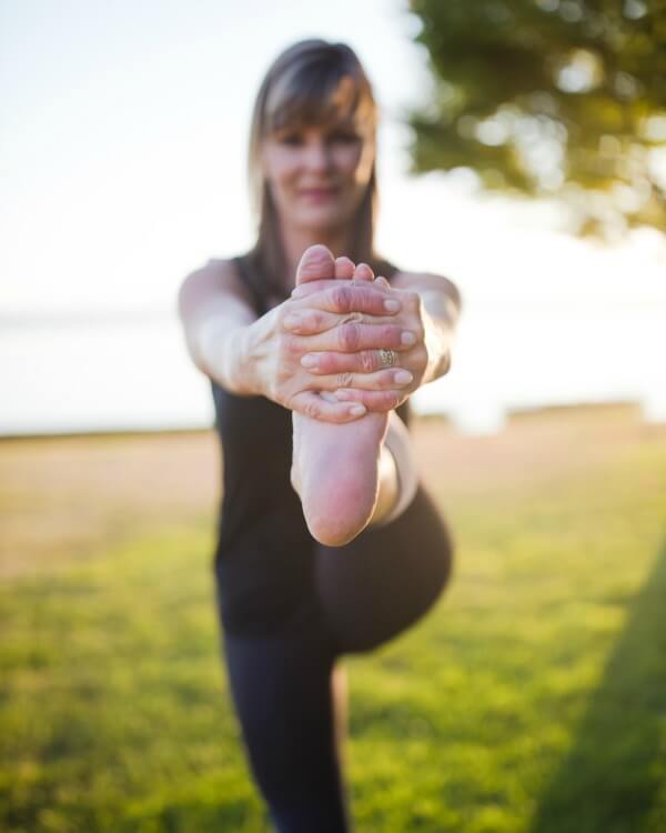 Marna Mcnaughton yoga instructor in Seattle doing yoga pose